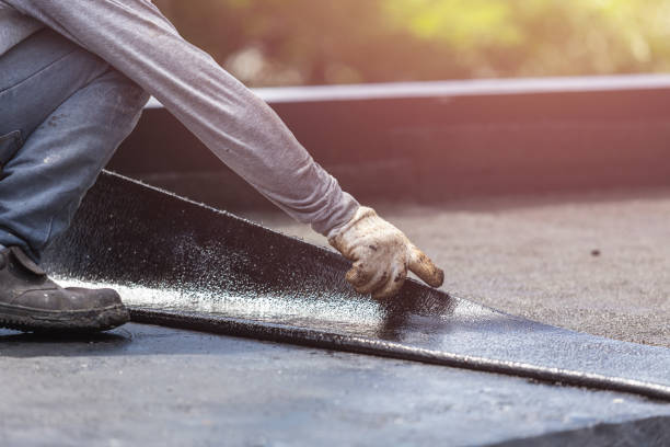 Professional Emergency Waterproofing technician working in Amesville, OH